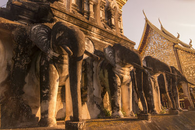 Low angle view of statue of temple