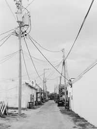 Street amidst buildings against sky