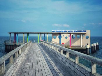 View of pier on sea against sky