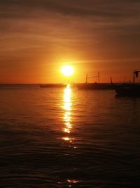 Scenic view of sea at sunset