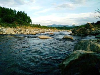 Scenic view of river against sky