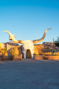 Traditional windmill against clear sky