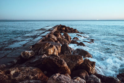 Scenic view of sea against clear sky