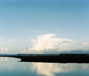 Pier over sea against sky