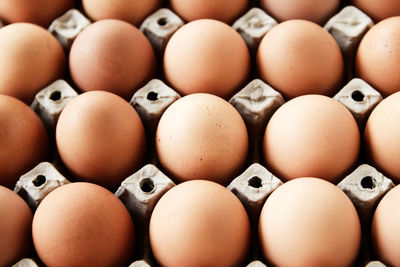 Full frame shot of eggs in carton