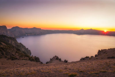 Scenic view of sea against sky during sunset