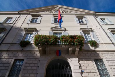 Low angle view of flag against building