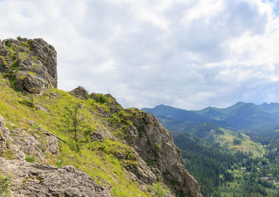 Scenic view of rocky mountains against sky