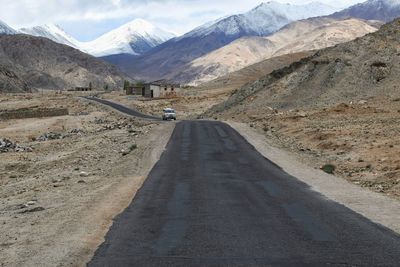 Road leading towards mountains