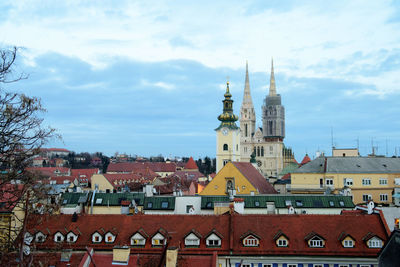 View of buildings in city against sky