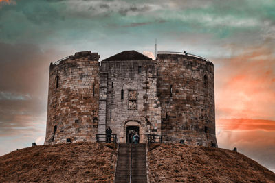 Low angle view of historic building against sky