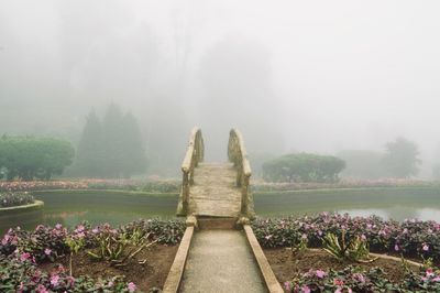 Scenic view of lake against cloudy sky