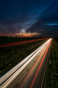 Light trails on road at night