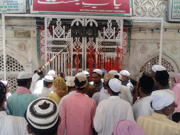 Group of people in front of building