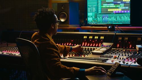 Man using sound mixer