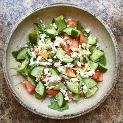 Directly above shot of vegetable salad served on table