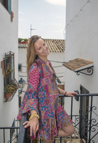 Beautiful woman posing in picturesque place of the village, mediterranean in altea spain