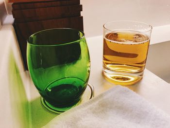 Close-up of beer glass on table