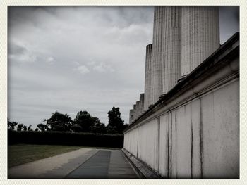 View of bridge against cloudy sky