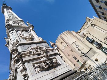 Low angle view of building against clear blue sky