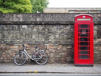 Bicycle on brick wall