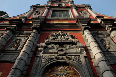Low angle view of ornate building against sky