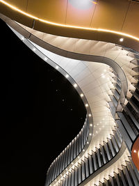 Low angle view of illuminated staircase in building