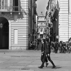 Full length of woman standing in city