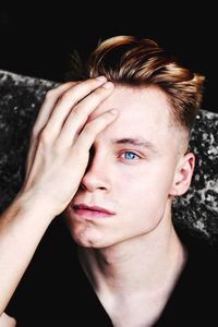 Close-up portrait of handsome young man