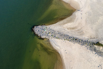 High angle view of wave on beach