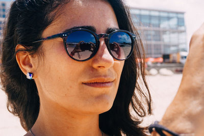 Portrait of woman wearing sunglasses