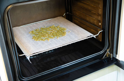 High angle view of food on metal window