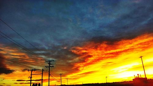 Low angle view of cloudy sky at sunset