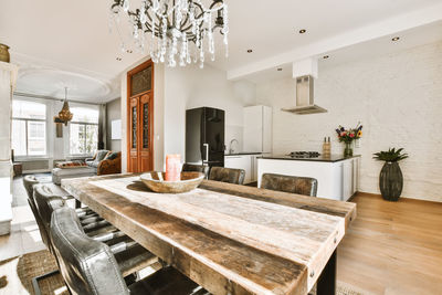 Wooden furniture in living room during sunny day