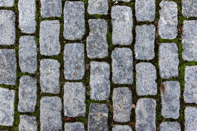 High angle view of stone on footpath