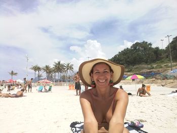 Portrait of a smiling young man on beach