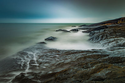 Scenic view of sea against clear sky