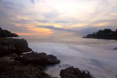 Scenic view of sea against sky during sunset