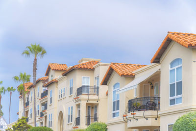 Low angle view of houses against sky