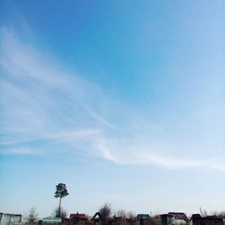 Low angle view of built structure against blue sky