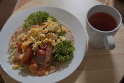 High angle view of breakfast served on table