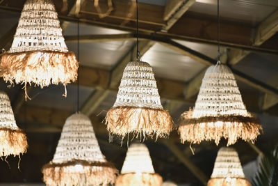 The wicker lamps hanging from the ceiling