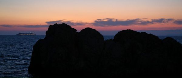 Scenic view of sea at sunset