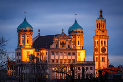 View of illuminated building against sky at dusk