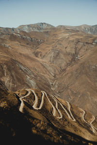 Road through the mountains and clouds