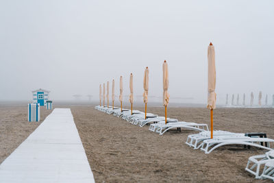Beach umbrella on misty morning