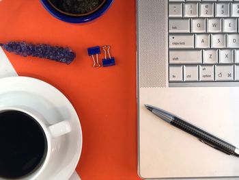 High angle view of coffee cup on table