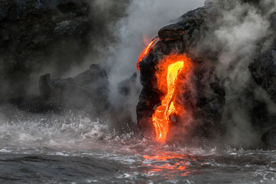 View of lava falling in sea