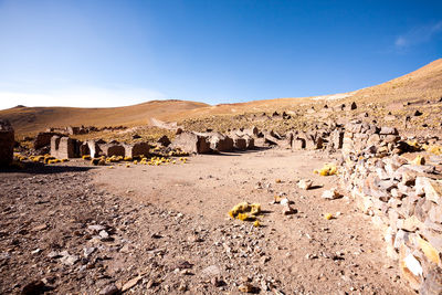 Scenic view of desert against clear sky