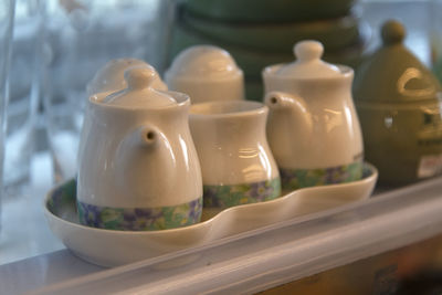 Close-up of tea cup on table